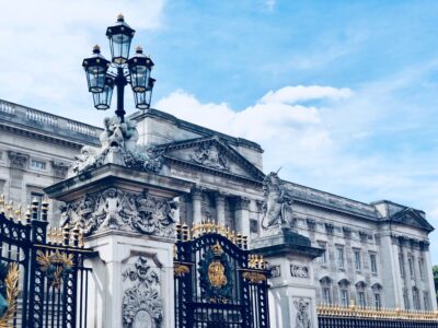 Buckingham Palace gates and front building detail by Dan on Unsplash