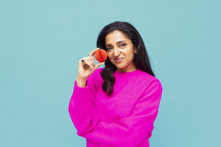 Sindhu Vee supports Red Nose Day 2023 by wearing the latest Nose, this year being provided by Amazon. Photo by Jake Turney/Comic Relief