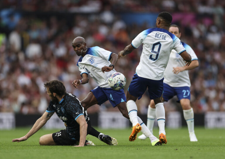 Sam Claflin of World XI, Mo Farah of England and Jermain Defoe of England during Soccer Aid for UNICEF 2023 taking place on Sunday 12th June at the Old Trafford, Manchester.