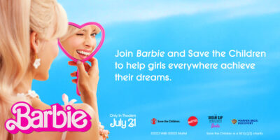 Image of Barbie holding mirror, various logos, and legal text. "Join Barbie and Save the Children to help girls everywhere achieve their dreams.
