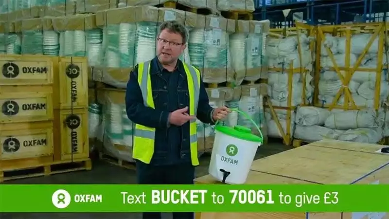 Ian Bray demonstrates the Oxfam bucket in a DRTV campaign