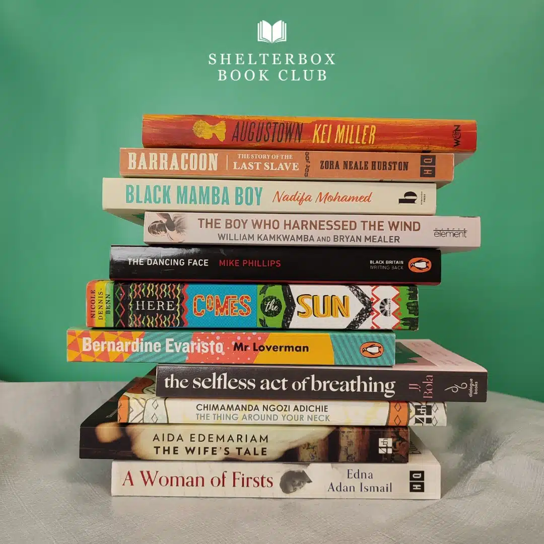 ShelterBox Book Club books in a stack