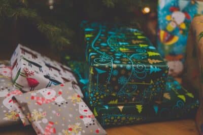 Chrstmas presents under a tree. By Markus Spiske on Pexels