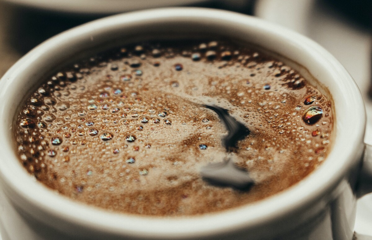 a black coffee in a mug. By Samir Daboul on pexels