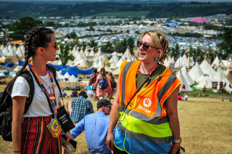 Volunteer stewards, Andrada Conti and Cathye Snell at Glastonbury Festival site. Credit: Andreea Alexandru / Oxfam