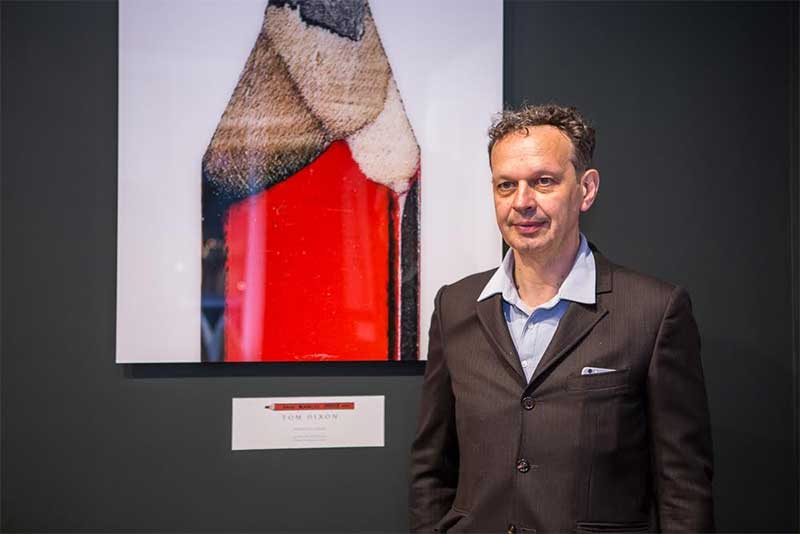 The Secret Life of the Pencil, with artist Tom Dixon standing in front of it.