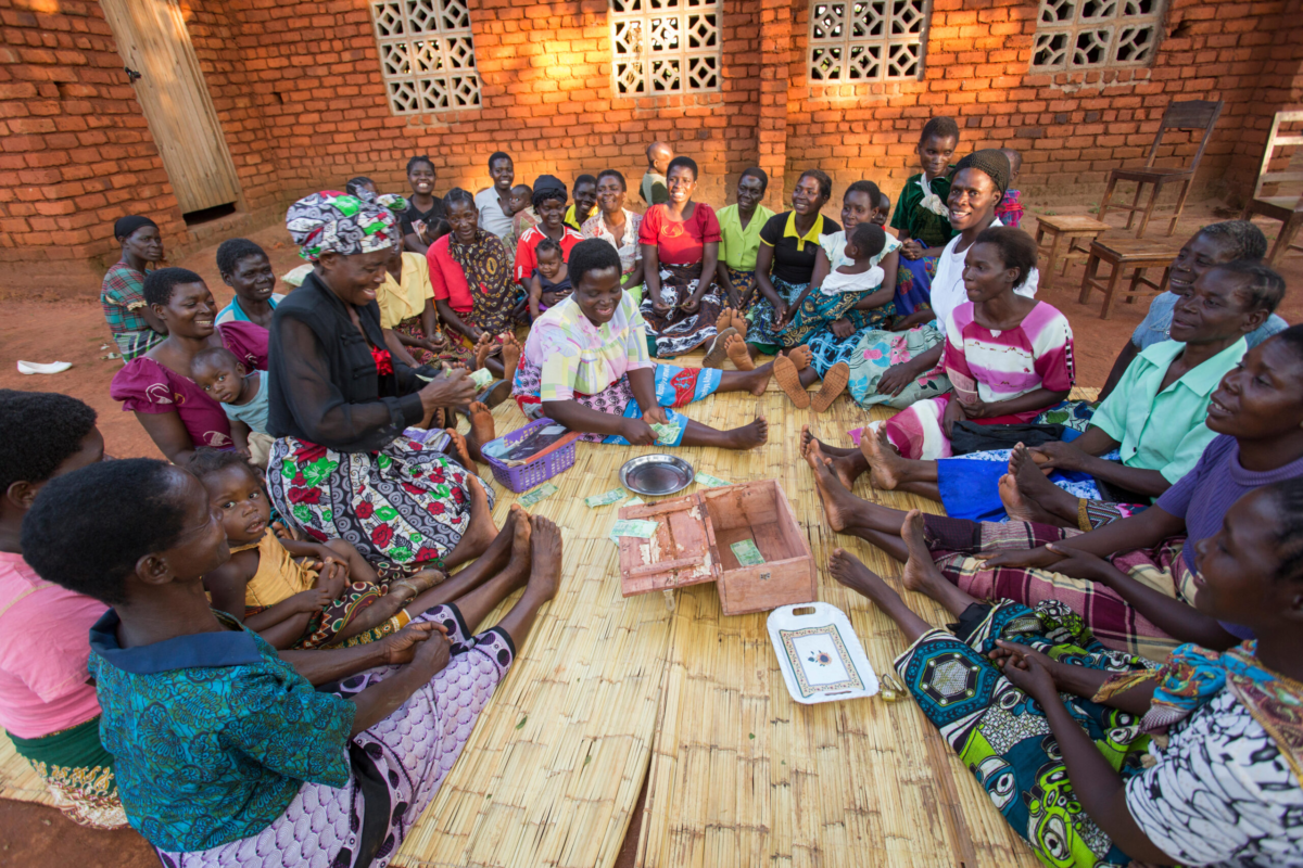 Women participate in a Village Savings and Loan meeting in Namasalima village, Mulanje District, Malawi.