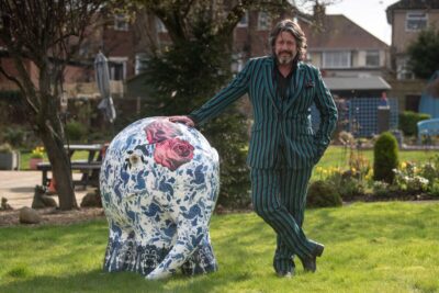 Lawrence Llewelyn Bowen with the elephant he has designed for Elmer's Big Parade in Blackpool