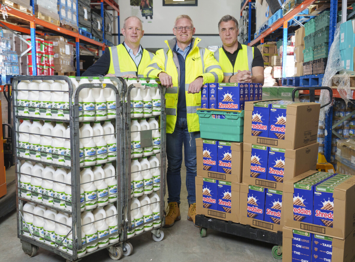 (Left to right) Jonathan Dixon, VP of Sales at Arla, Simon Millard, Director of Food at FareShare and Andrew Shaw, Supply Chain Director at Nestlé. Photo credit: Dominic Lipinski/PA Wire