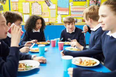Schoolchildren eating during a lunchbreak