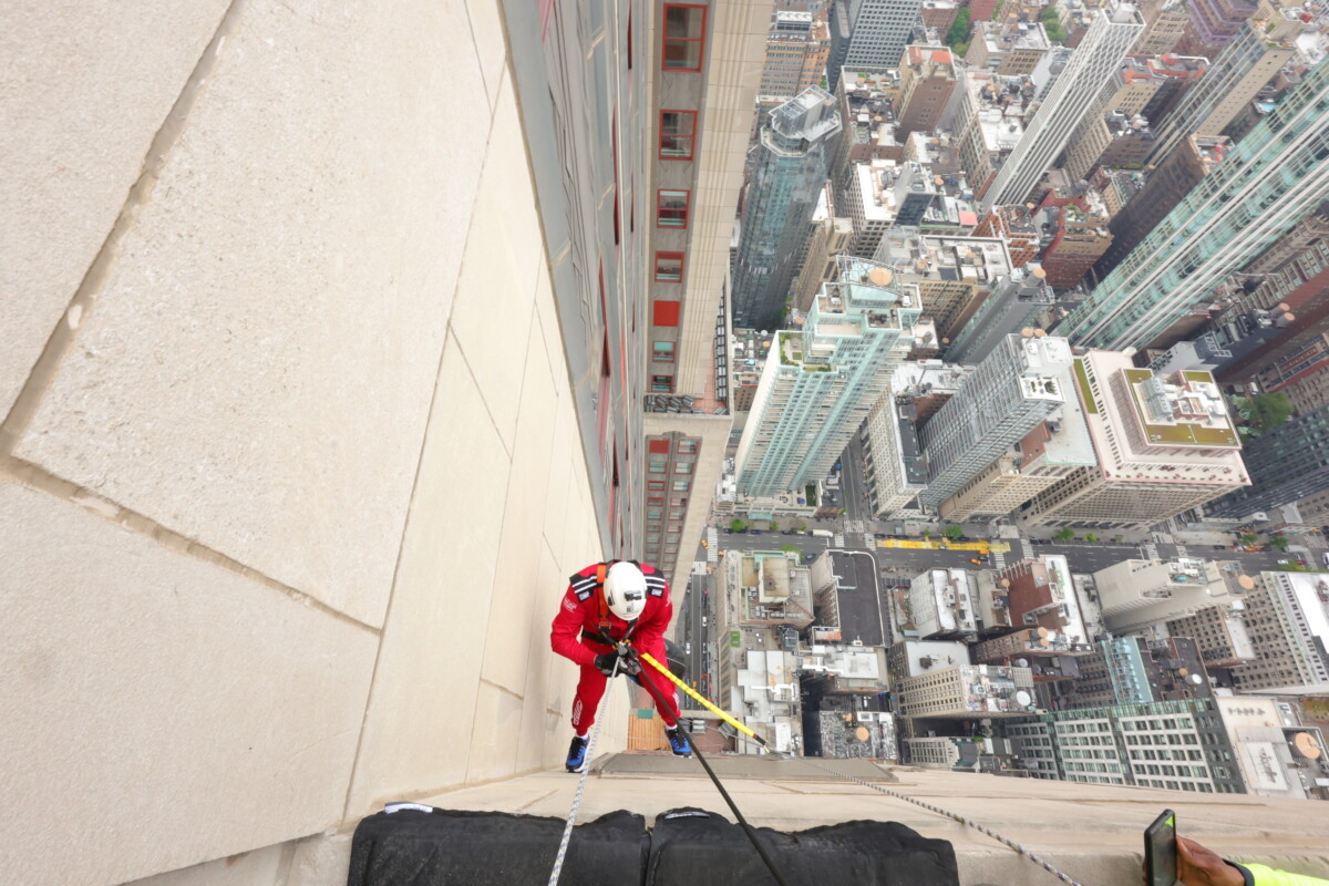 The view down the side of the Empire State Building as one abseiler descends.