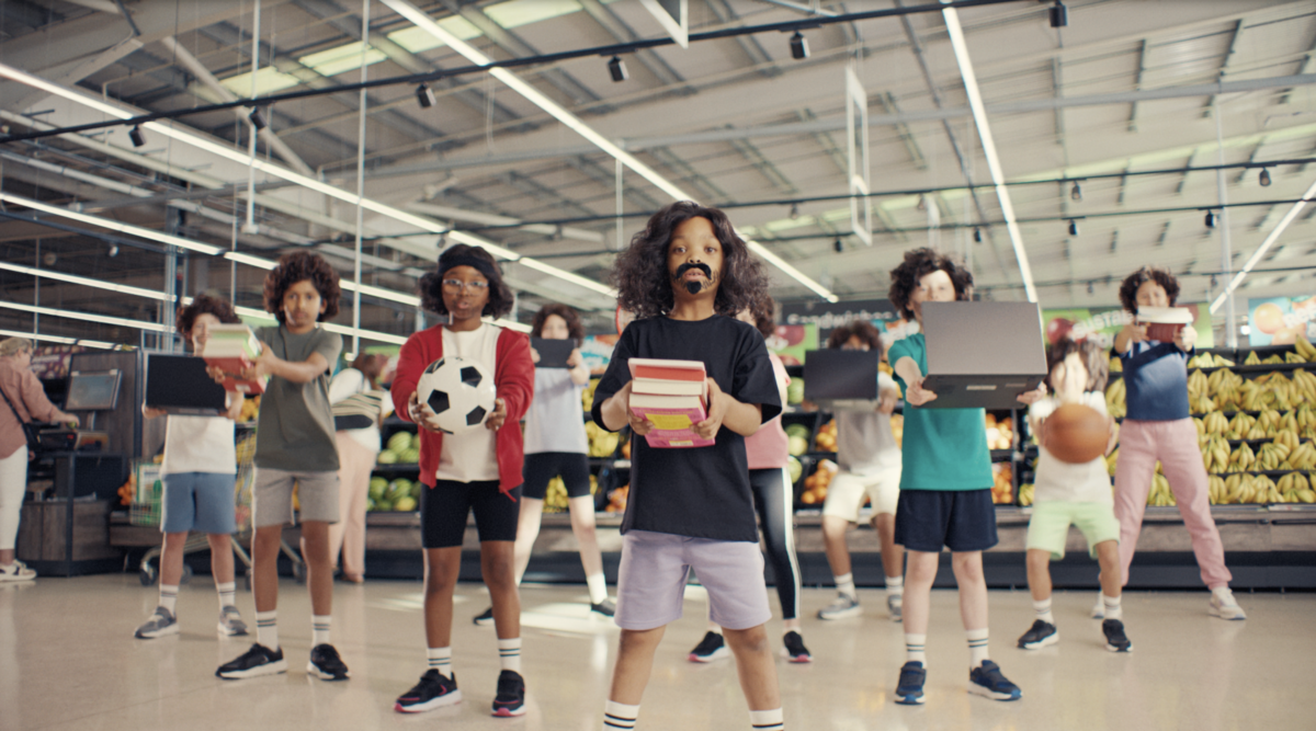 A still from an ASDA ad, showing children dressed up as Joe Wicks