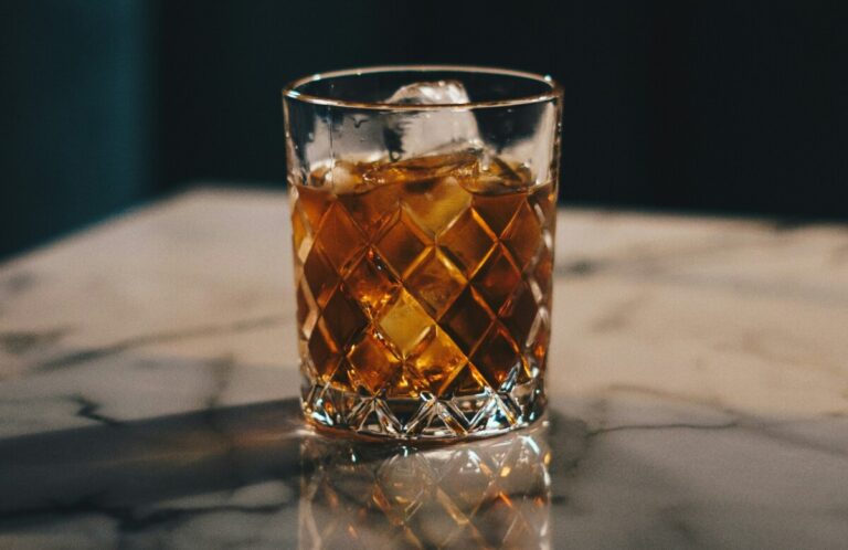 A tumbler of whiskey. By Ambitious Studio Rick Barrett