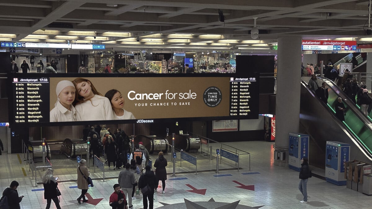 Aamu Foundation's shocking 'Cancer for Sale' fundraising campaign on a large ad spot in a Finnish railway station.