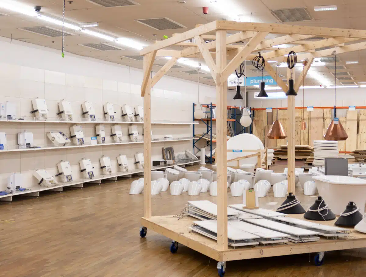 Interior of Habitat for Humanity GB's first ReStore DIY charity shop showing bathroom fittings