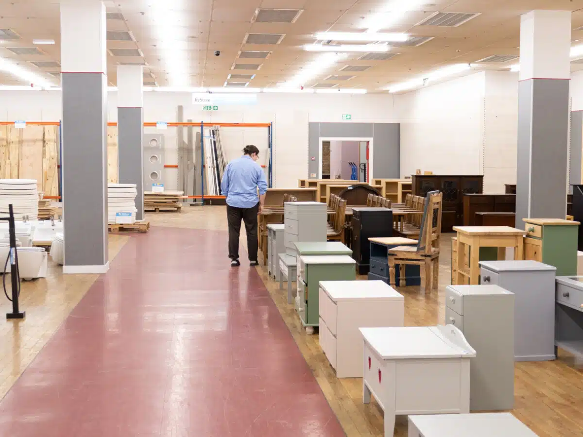 Interior of Habitat for Humanity GB's first ReStore DIY charity shop showing white goods