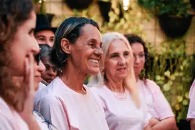 A group of women smiling - from The Caring Family Foundation