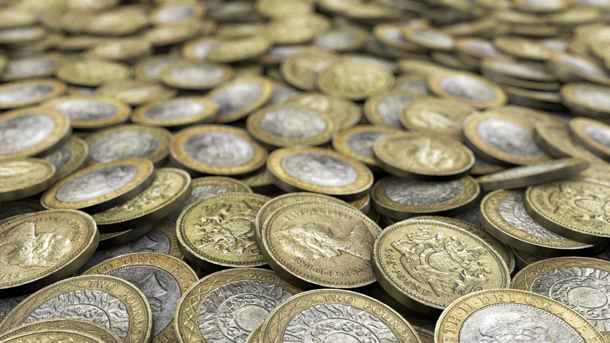 A pile of £1 and £2 coins. From Pixabay.