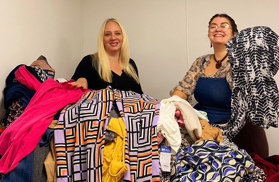 Havens Hospices staff with clothing for their Mystery Bags