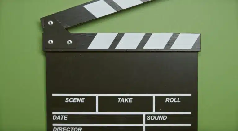 A clapper board against a green background. By Tima Miroshnichenko on Pexels