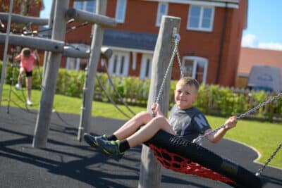 Children playing outside Persimmon Pershore homes.