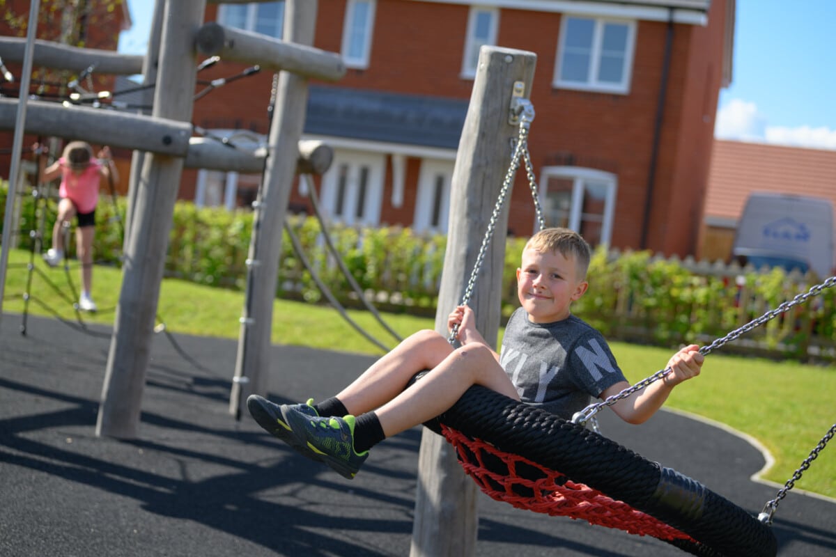 Children playing outside Persimmon Pershore homes.