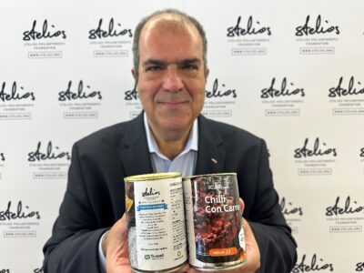 Sir Stelios with the canned chilli con carne which is donated to the food banks in the UK