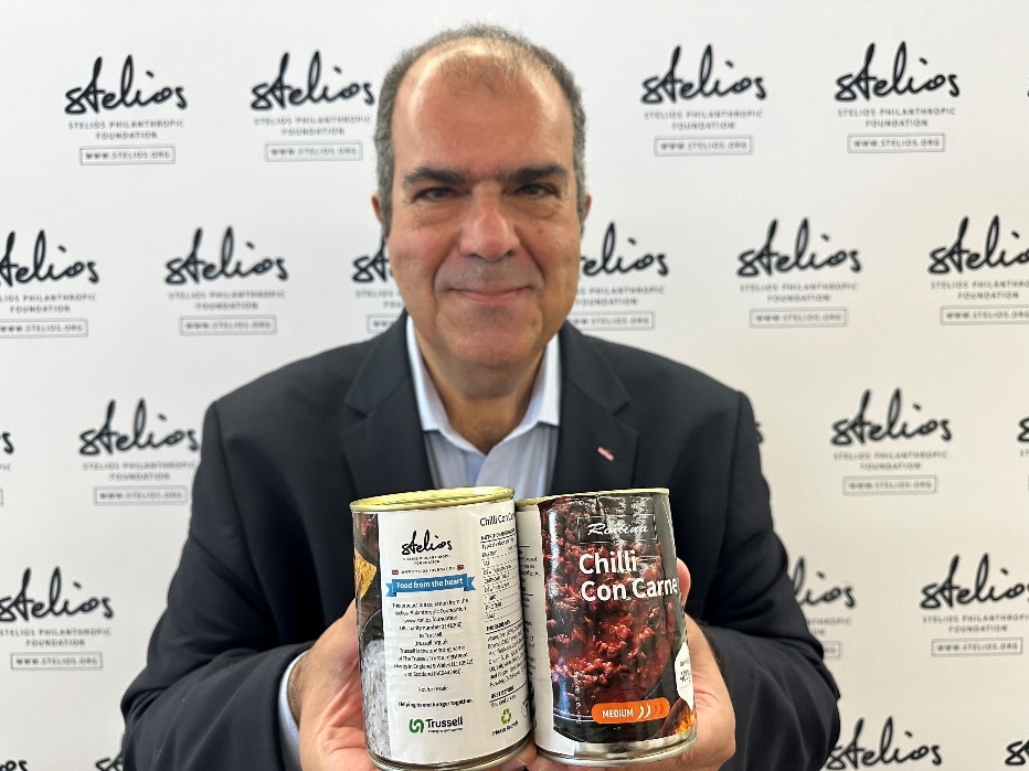 Sir Stelios with the canned chilli con carne which is donated to the food banks in the UK