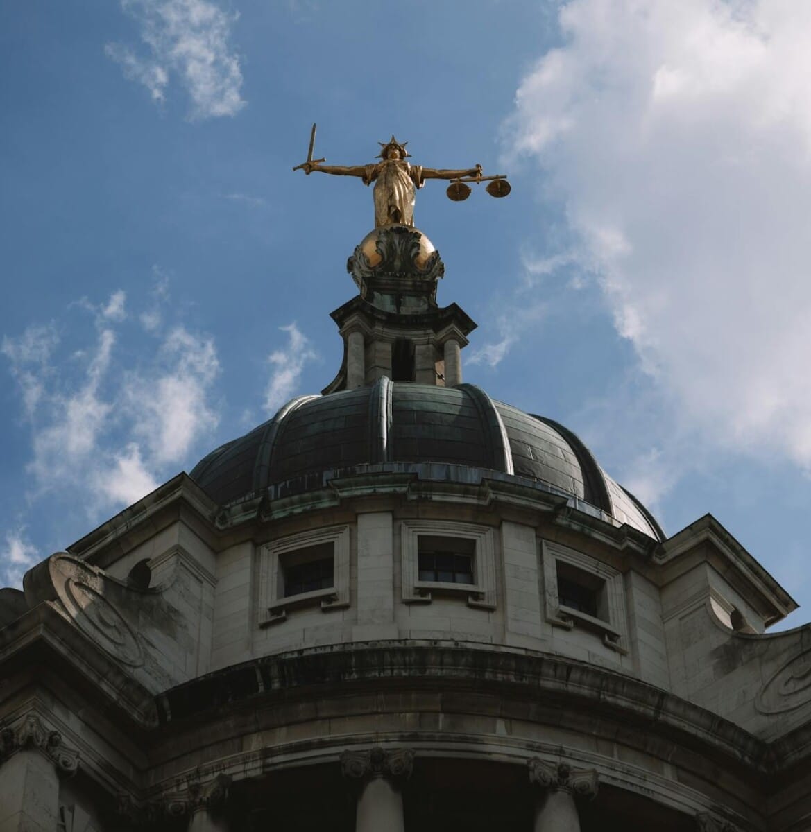 Lady Justice statue on top of the Old Bailey, London.