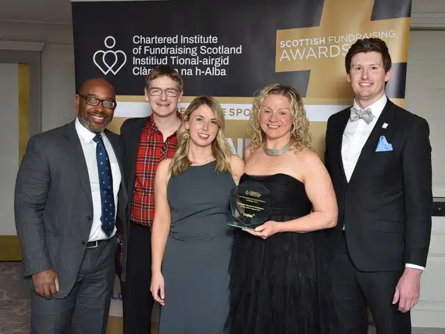 Scotland's Charity Air Ambulance team with Criona Knight with their Scottish Fundraising Awards award.