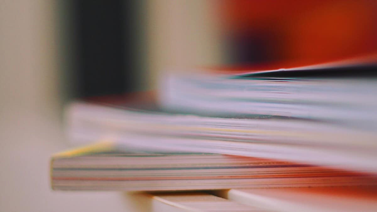 Books and magazines piled on top of each other.