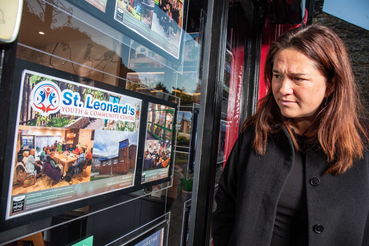A spoof advert in an estate agents' window for a community venue.