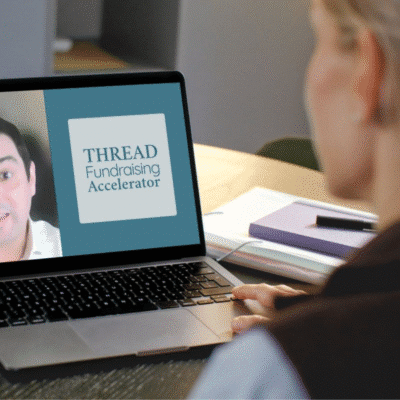 Thread Fundraising Accelerator logo and a partial photo of Craig Linton on a laptop screen, with a women viewing it at a desk.