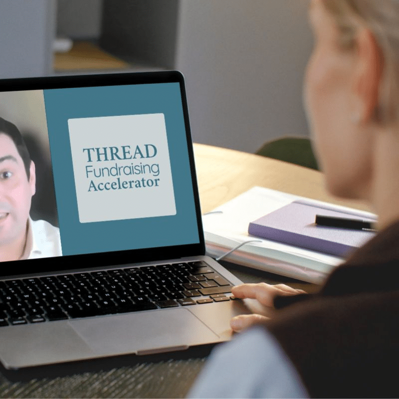 Thread Fundraising Accelerator logo and a partial photo of Craig Linton on a laptop screen, with a women viewing it at a desk.