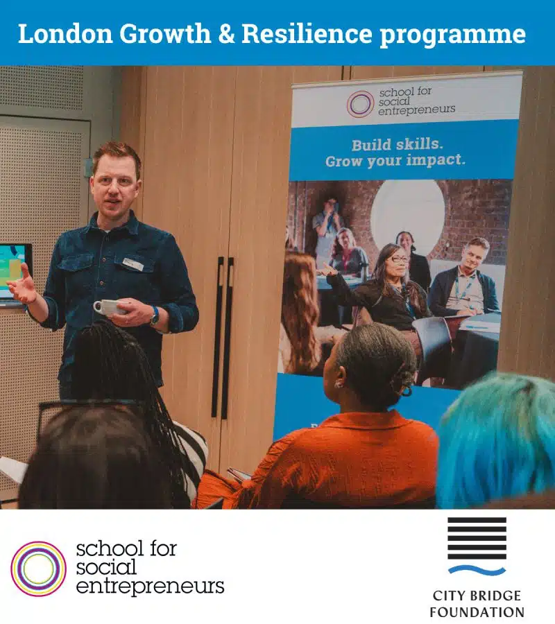 London Growth & Resilience Programme. A male speaker presents at an event for charities.