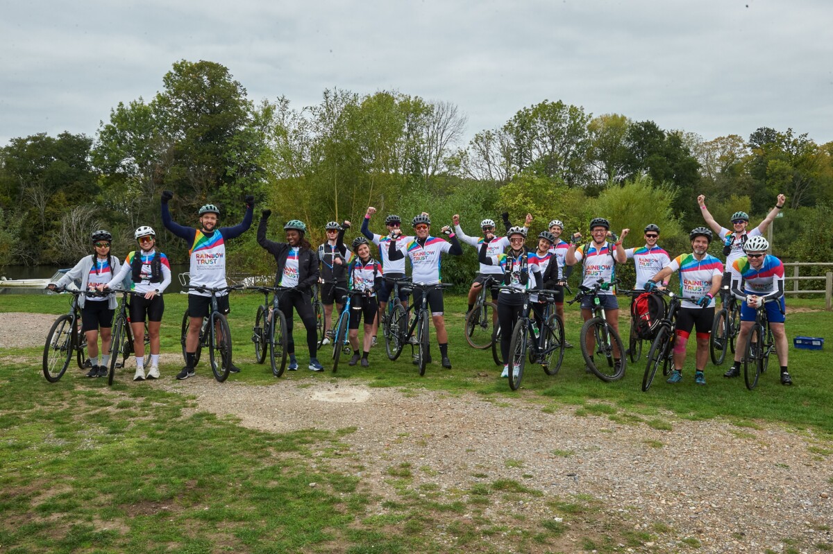 Invesco staff with bikes on the Thames Challenge for Rainbow Trust 2025.