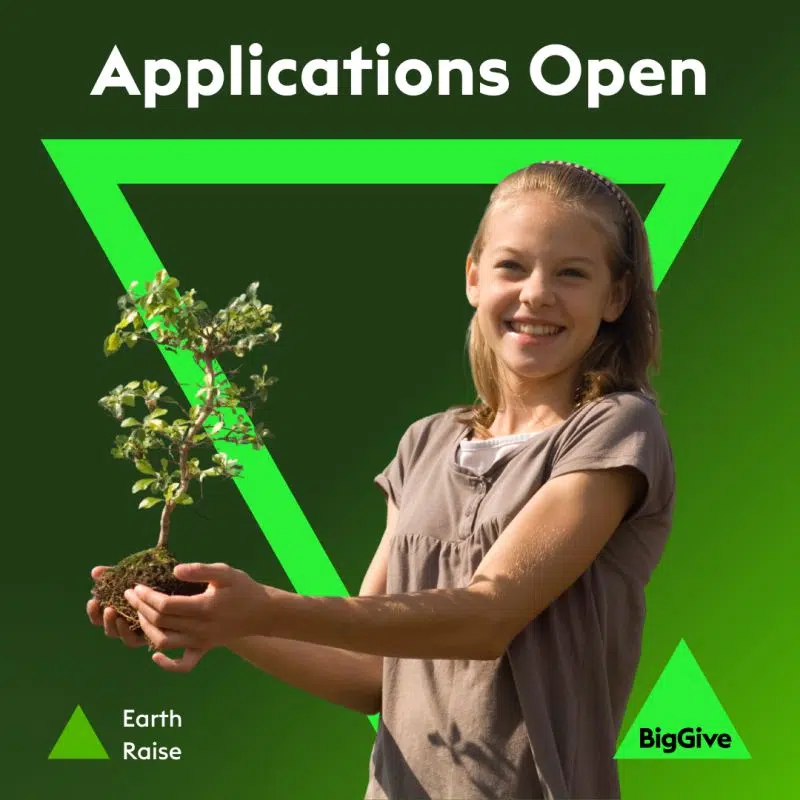 Applications open for Earth Rise. Young girl smiles as she holds a small plant. Big Give logo to the bottom right and a bright green triangle complements the background colour green.