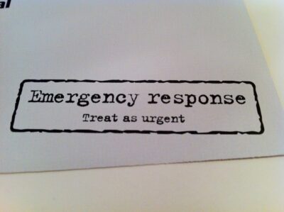 Emergency response, treat as urgent. Stamped text on a fundraising appeal envelope.