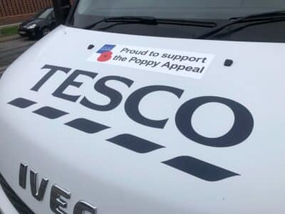 Tesco shopping terminal with charity party Royal British Legion featured.