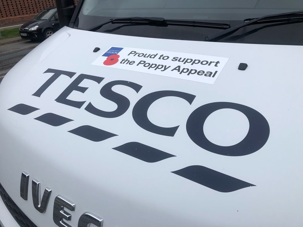 Tesco shopping terminal with charity party Royal British Legion featured.