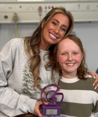 Stacey Solomon presents Kirsty Waugh with her JustGiving award